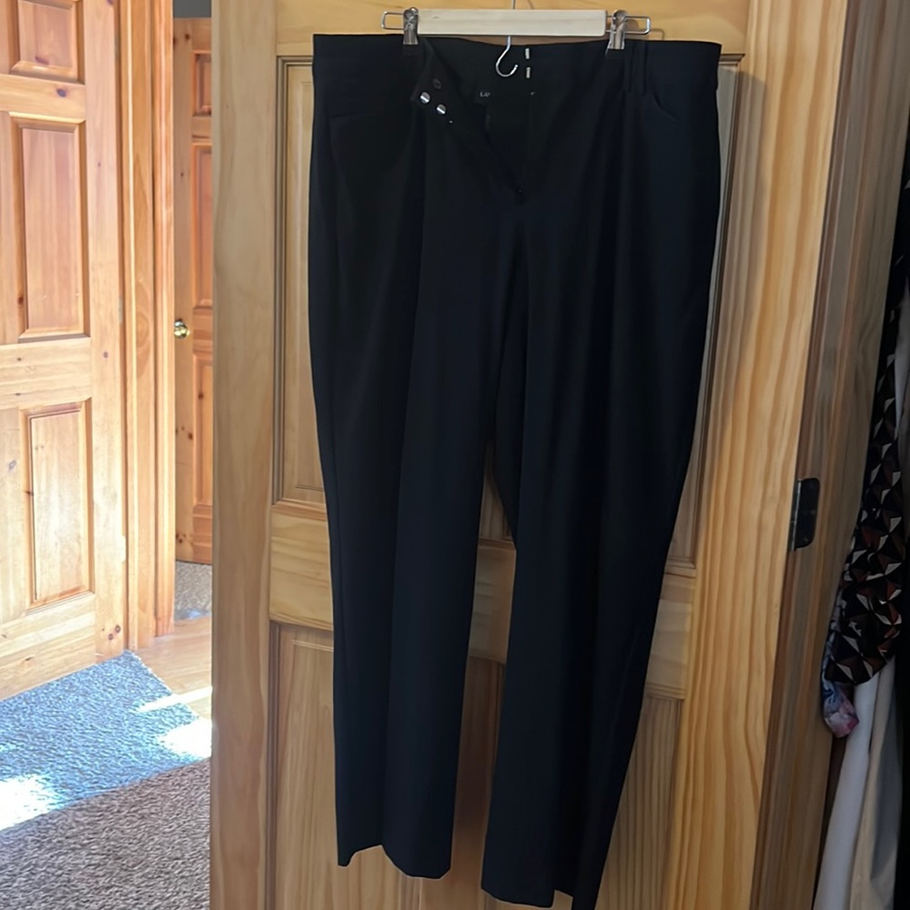 Black dress pant with wider leg bottom
